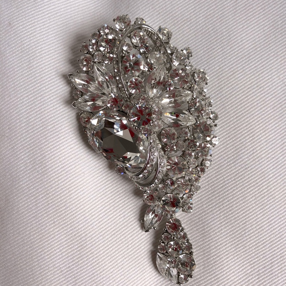 Silver rhinestone brooch
